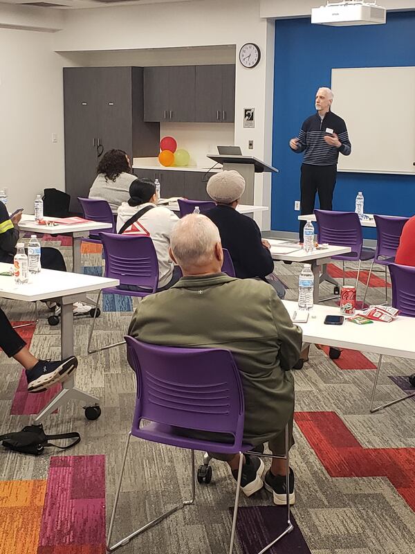 The Gwinnett County Library has created a six-month free program to teach former prison and jail inmates to become entrepreneurs. Here, students here from guest lecturer. Courtesy of Gwinnett library