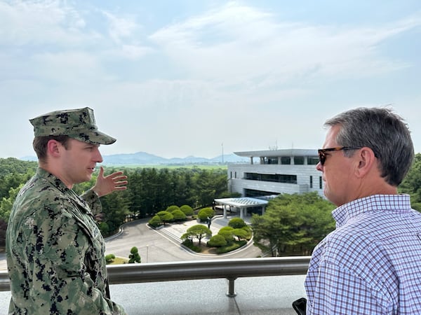 Gov. Brian Kemp (right) visited the demilitarized zone separating the Korean Peninsula on Thursday. 