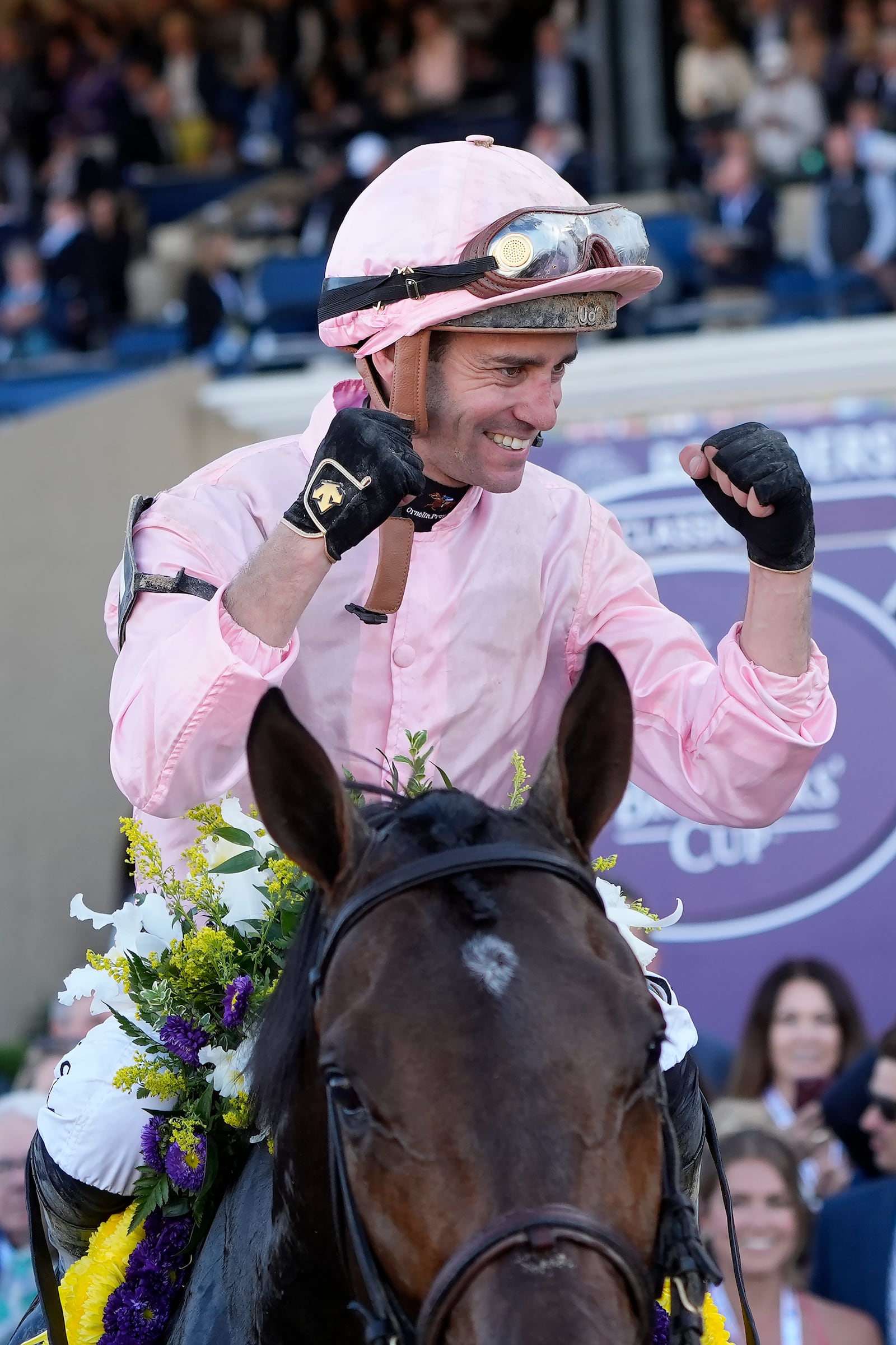 Flavien Prat celebrates after riding Sierra Leone to victory in the Breeders' Cup Classic horse race in Del Mar, Calif., Saturday, Nov. 2, 2024. (AP Photo/Gregory Bull)