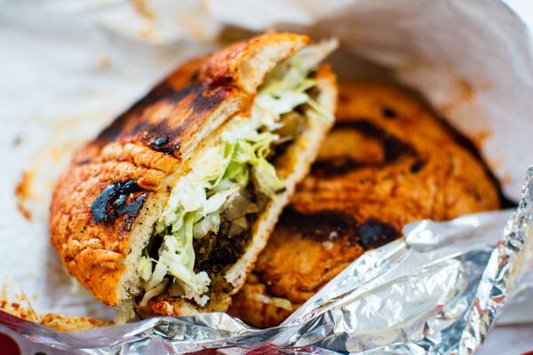 The delightfully messy potato and chorizo pambazo from Tortas Factory del D.F. on Buford Highway. CONTRIBUTED BY HENRI HOLLIS