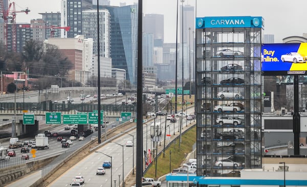 February 22, 2022, Atlanta: Carvana, which launched in January 2013 at the High Museum of Art, now operates several logistics hubs and an inspection center in Georgia. It opened a 12-story Car Vending Machine, the tallest in the U.S., in November 2020 in Midtown. (John Spink/AJC)

