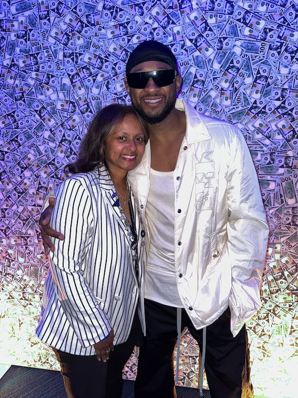 Former LaFace Records promotions director Shanti Das poses with Usher following one of his Vegas residency performances. 
(Courtesy of Shanti Das)