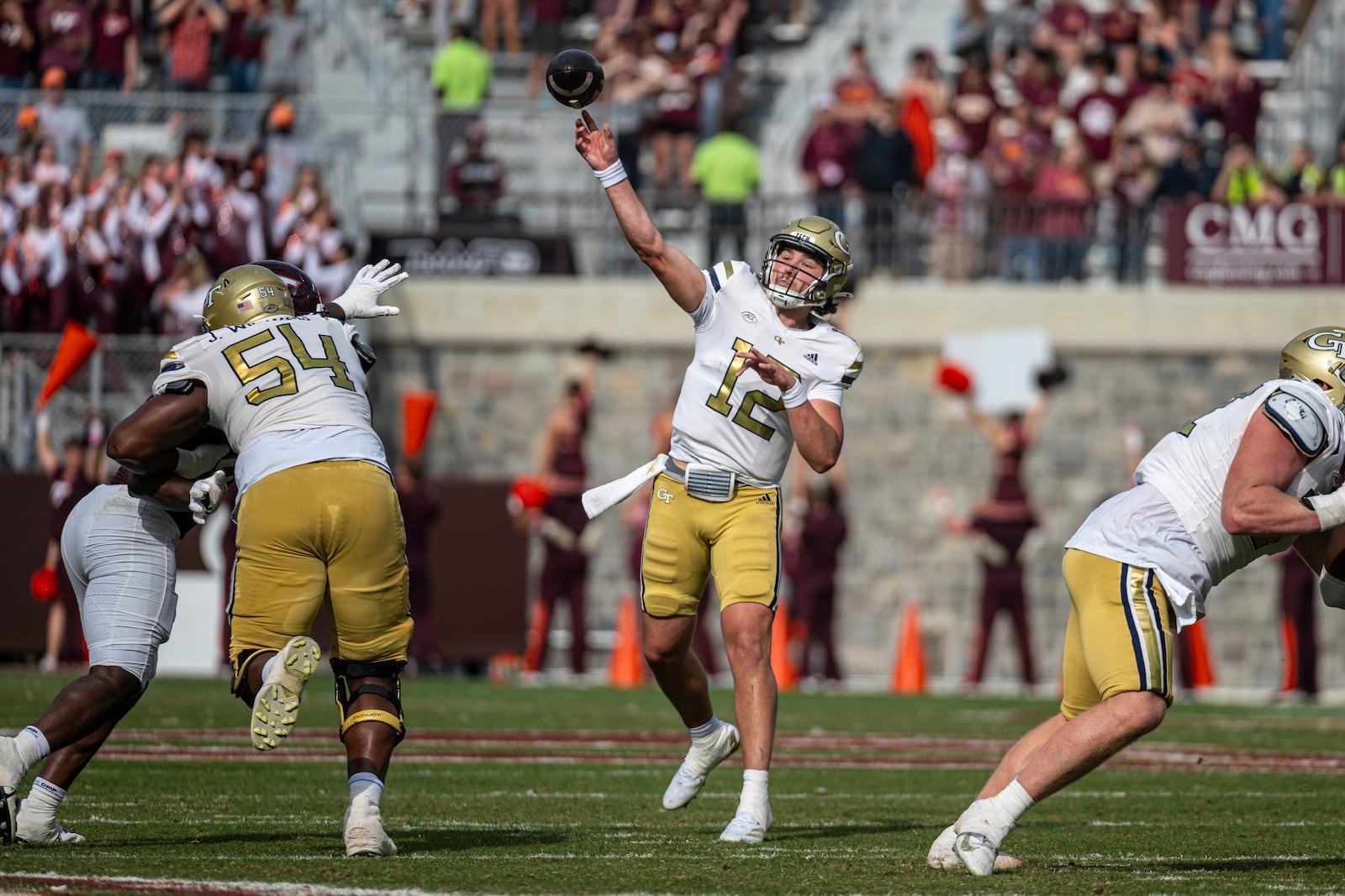 Georgia Tech's Aaron Philo passes downfield against Virginia Tech during the second half of an NCAA college football game, Saturday, Oct. 26, 2024, in Blacksburg, Va. (AP Photo/Robert Simmons)