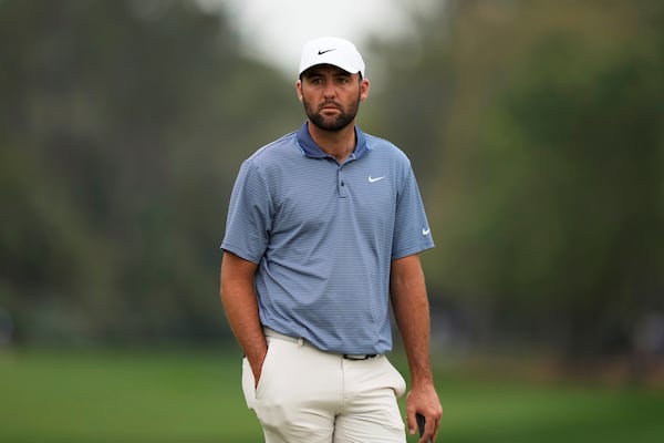 Scottie Scheffler waits for his turn on the second hole during the final round of The Players Championship golf tournament Sunday, March 16, 2025, in Ponte Vedra Beach, Fla. (AP Photo/Julia Demaree Nikhinson)