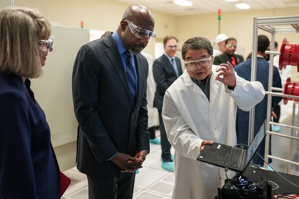 U.S. Sen. Raphael Warnock is championing legislation to protect a popular hiking trail. He is pictured on a recent visit to a fiber-optic cable manufacturing facility in Norcross.