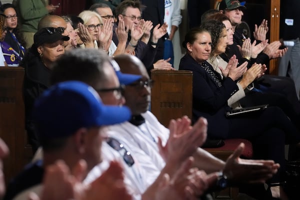 Former Los Angeles Fire Dept. Chief Kristin Crowley, at right, attends a city council meeting Tuesday, March 4, 2025, in Los Angeles. (AP Photo/Damian Dovarganes)