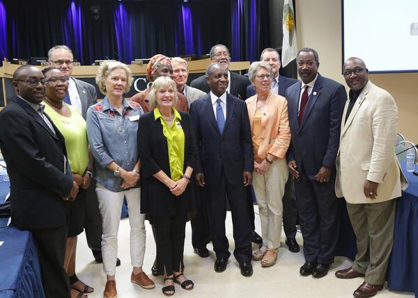 DeKalb County CEO Mike Thurmond poses for a group shot with mayors, county commissioners and city officials after their discussion Thursday of DeKalb’s proposed sales tax increase. From left: DeKalb Commissioner Larry Johnson, Stone Mountain Councilwoman Chakira Johnson, DeKalb Commissioner Jeff Rader, Pine Lake Mayor Melanie Hammet, Lithonia Mayor Deborah Jackson, Dunwoody Mayor Denis Shortal, Thurmond, Stonecrest Mayor Jason Lary, DeKalb Commissioner Kathie Gannon, Tucker Mayor Frank Auman, DeKalb Commissioner Steve Bradshaw and DeKalb Commissioner Greg Adams. (Akili-Casundria Ramsess/Special to the AJC)