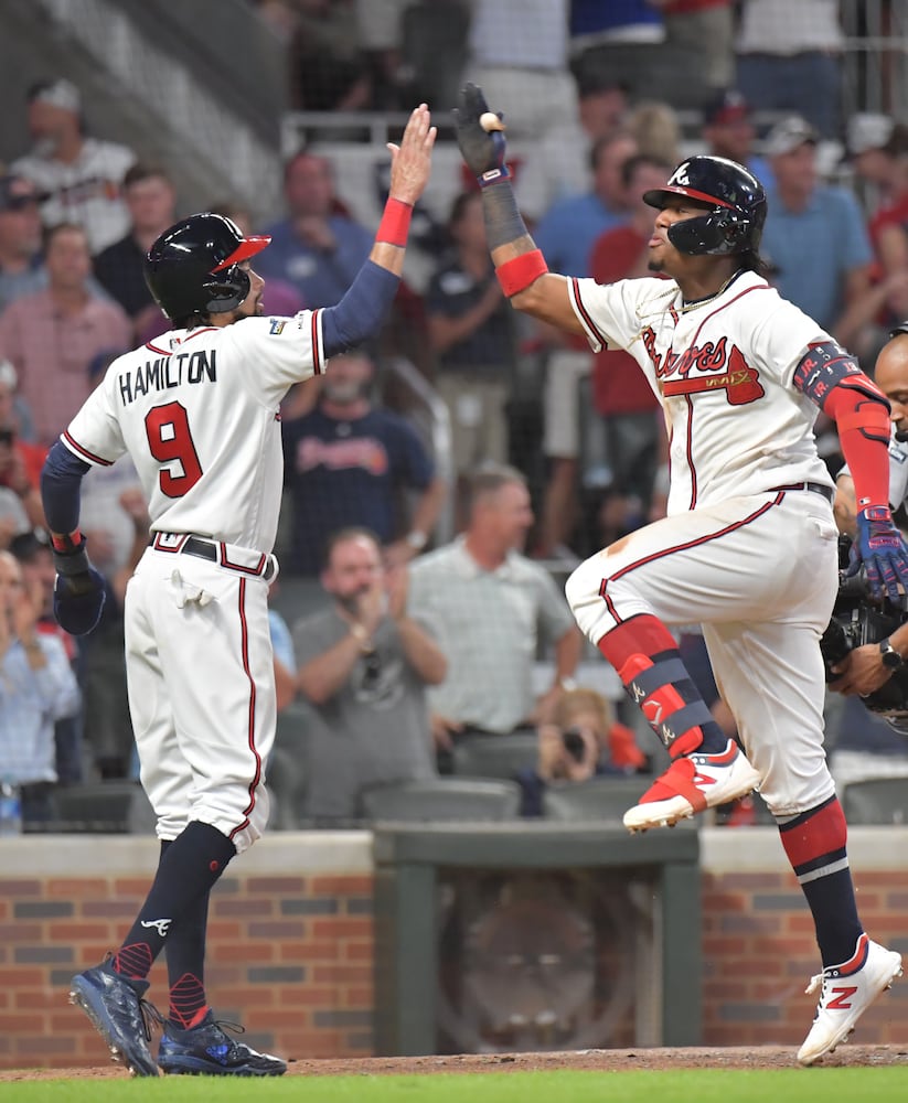 Photos: Braves drop Game 1 to the Cardinals