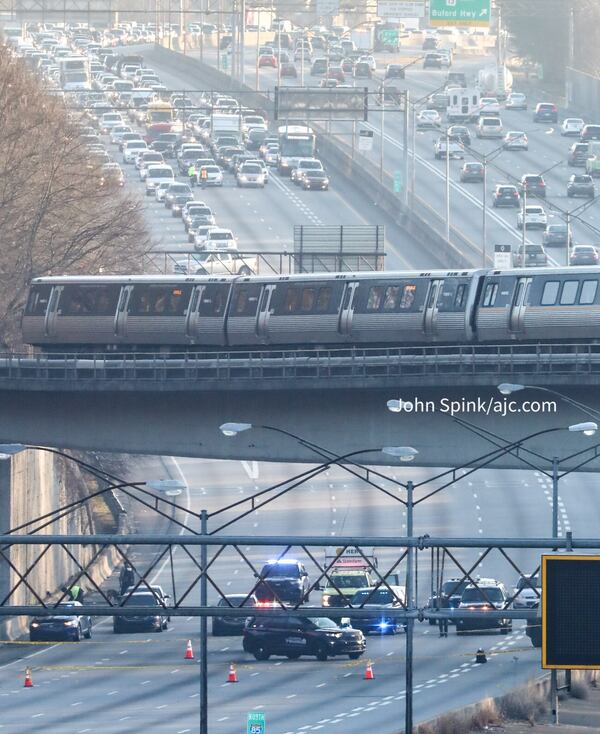 Authorities were on the scene Wednesday of a deadly shooting on I-85 South near the Brookwood interchange. 