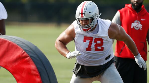 Ohio State defensive lineman Tommy Togiai runs a drill during NCAA college football practice, Friday, Aug. 2, 2019, in Columbus, Ohio. (Jau LaPrete/AP)