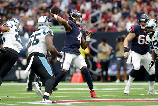 HOUSTON, TX - SEPTEMBER 29:  Deshaun Watson #4 of the Houston Texans throws a pass in the first quarter against the Carolina Panthers at NRG Stadium on September 29, 2019 in Houston, Texas.  (Photo by Tim Warner/Getty Images)