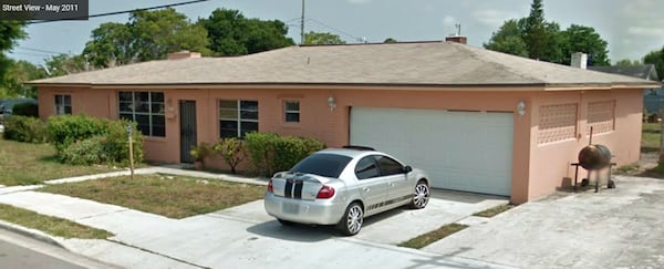 The Fort Pierce, Florida, home where Gregory Vaughn Hill Jr. was slain Jan. 14, 2014, by a St. Lucie County sheriff's deputy is pictured in a May 2011 Google Street View image. Hill, 30, was shot three times through the garage door after deputies said he pointed a gun at them. A federal jury last week awarded Hill's family $4 in their civil lawsuit, which was later reduced to 4 cents.