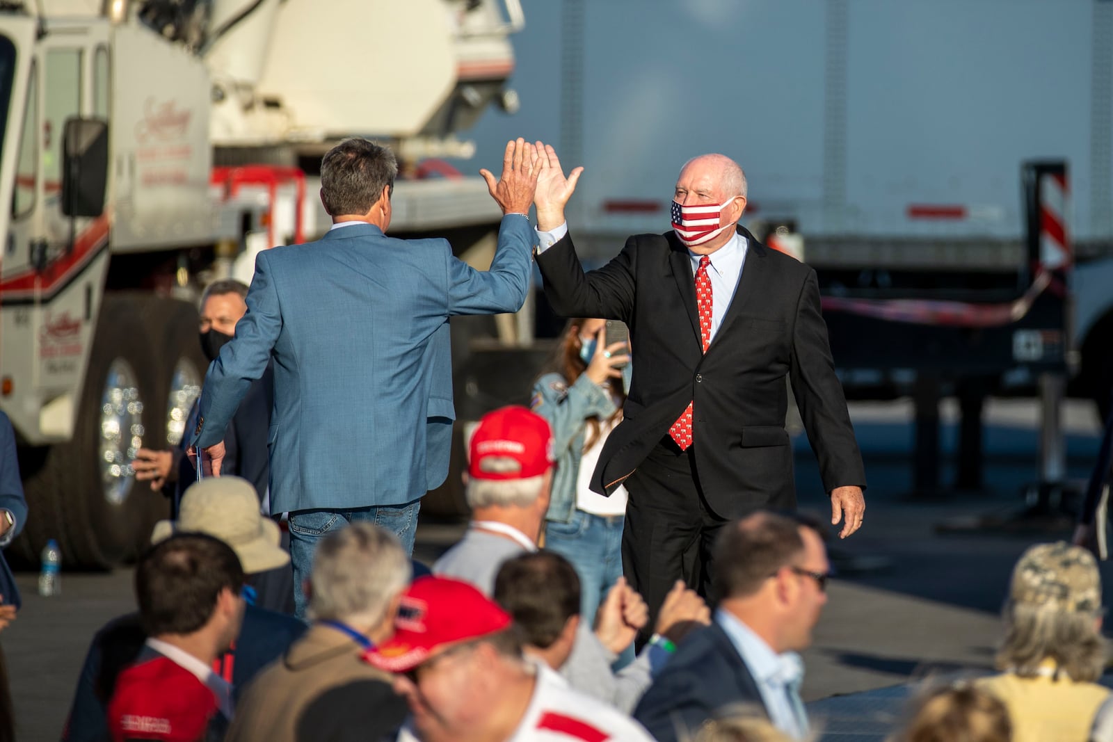 The yearlong effort by Gov. Brian Kemp, left, to place former Gov. Sonny Perdue atop the state's higher education system should endear him with conservatives as his bid for reelection faces a challenge in the GOP primary from Perdue's cousin, former U.S. Sen. David Perdue. (Alyssa Pointer / Alyssa.Pointer@ajc.com)