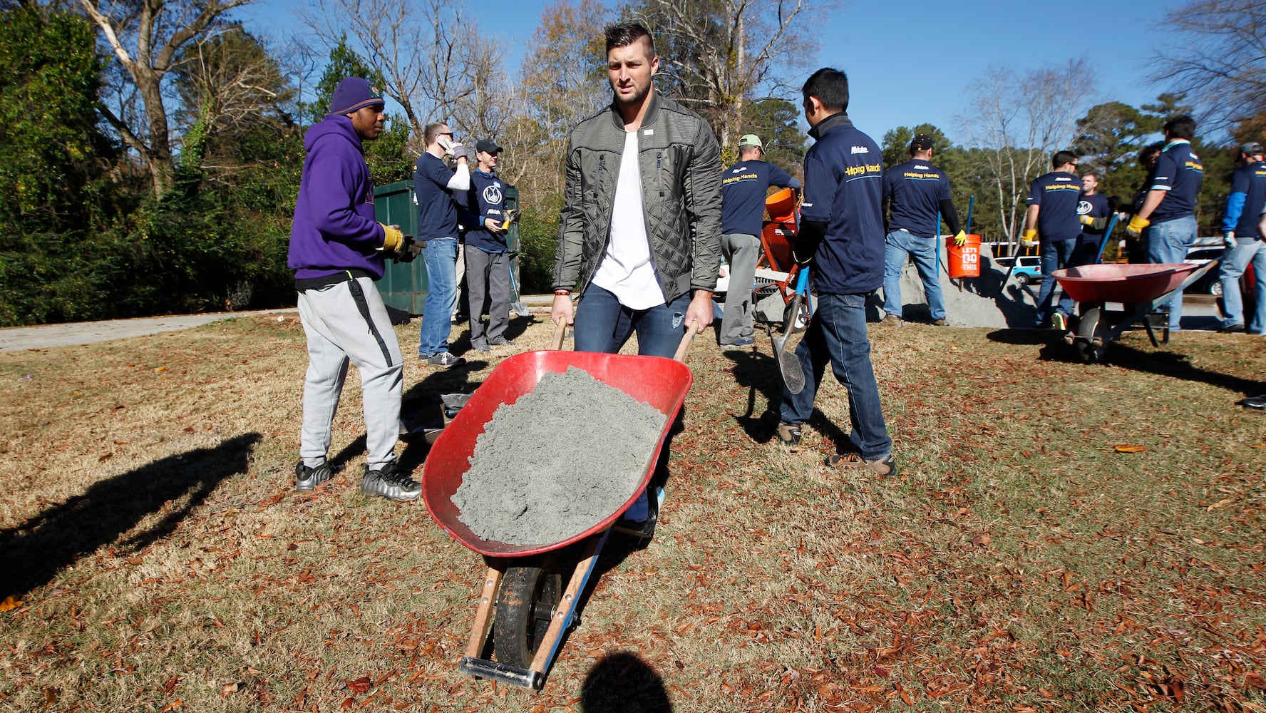 SEC stars build football field in DeKalb