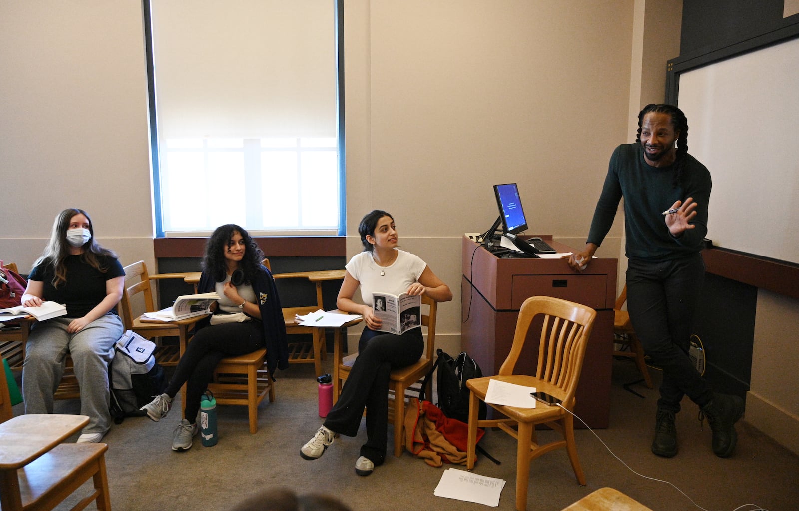 Jericho Brown, Charles Howard Candler Professor of English and Creative Writing, teaches his class at Emory University, Tuesday, February 6, 2024, in Atlanta. Jericho Brown is one of contemporary literature’s most acclaimed poets. In 2019, his third book, “The Tradition”, won him the 2020 Pulitzer Prize for Poetry. Along with the Pulitzer, he has won a Whiting Award, a Guggenheim Fellowship, an American Book Award and was the inaugural winner of the Anisfield-Wolf Book Award for poetry. (Hyosub Shin / Hyosub.Shin@ajc.com)