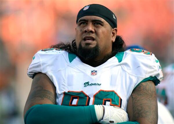 Miami Dolphins defensive tackle Paul Soliai (96) looks up at the scoreboard during the final minutes of an NFL football game, Sunday, Nov. 11, 2012, in Miami.(AP Photo/Rhona Wise) Miami Dolphins defensive tackle Paul Soliai (96) looks up at the scoreboard during the final minutes of an NFL football game, Sunday, Nov. 11, 2012, in Miami.(AP Photo/Rhona Wise)