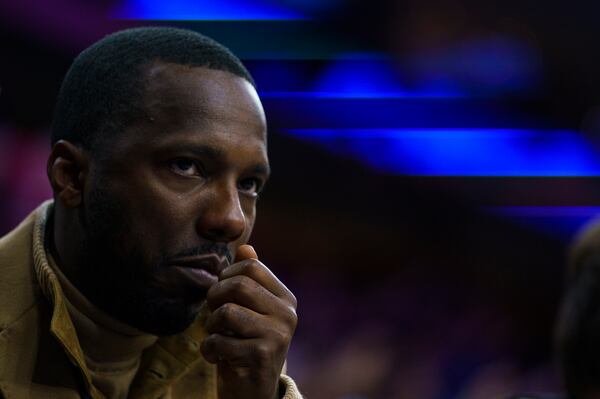 CEO of Klutch Sports Group Rich Paul looks on from court side during the first half of an NBA basketball game between the Charlotte Hornets and the Philadelphia 76ers, Wednesday, Jan. 12, 2022, in Philadelphia. (AP Photo/Chris Szagola)