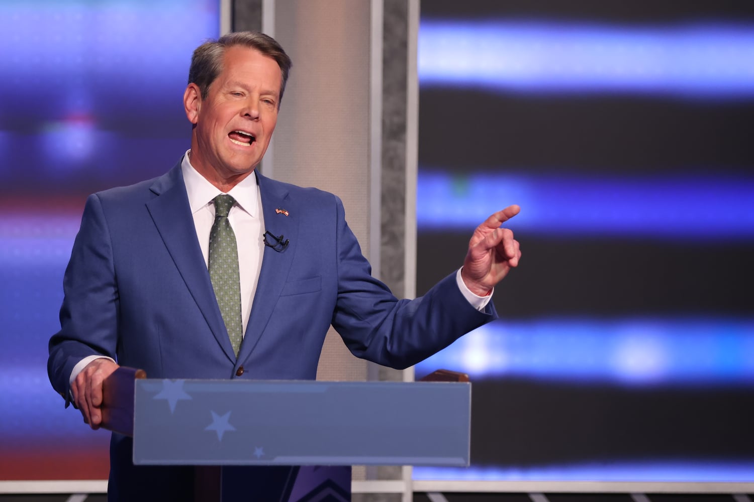 Gov. Brian Kemp responds to former U.S. Sen. David Perdue during the first debate of the Republican primary for governor on Sunday, April 24, 2022. (Photo: Miguel Martinez/miguel.martinezjimenez@ajc.com)