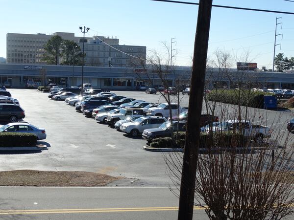 The Punchline is losing access to this parking lot across from the club, necessitating the move. CREDIT: Rodney Ho/rho@ajc.com