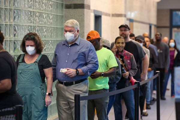 Voters wait for the polls to open at Lucky Shoals Park Community Recreation Center in Tuesday, Nov. 8, 2022, Norcross. PHIL SKINNER FOR THE ATLANTA JOURNAL-CONSTITUTION