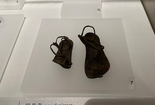 Israeli antiquities collector Oded Golan has opened a temporary "Discovering the World of Jesus" exhibition at Pullman Yards until Feb. 28, 2025 that includes a well-preserved pair of baby shoes that are likely 2,000-plus years old. RODNEY HO/rho@ajc.com