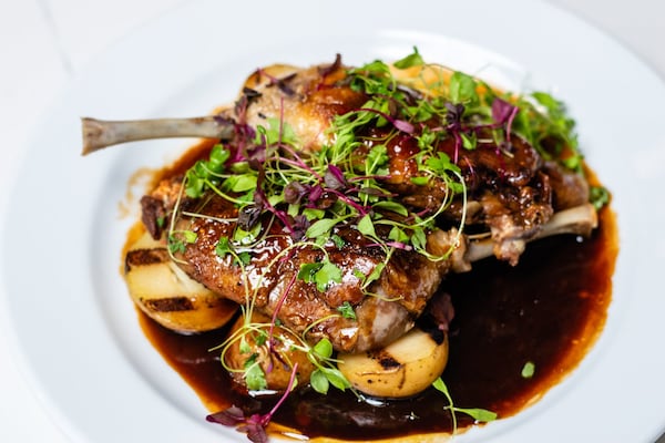 The duck confit at the Brasserie is a luxurious classic, especially when ordered with two full duck legs. CONTRIBUTED BY HENRI HOLLIS