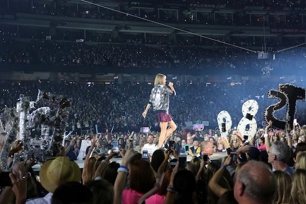 Taylor Swift and a few of her fans at the Georgia Dome Saturday night. Photo: Robb D. Cohen/www.RobbsPhotos.com.