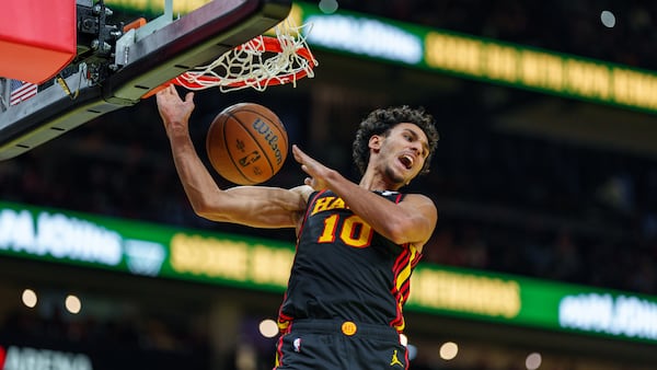 Atlanta Hawks forward Zaccharie Risacher (10) dunks the ball during the second half of an Emirates NBA Cup basketball game against the Cleveland Cavaliers on Friday, Nov. 29, 2024, in Atlanta, at State Farm Arena. (Atlanta Journal-Constitution/Jason Allen)

