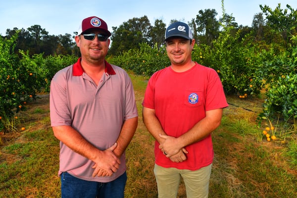 Brothers Justin Corbett (left) and Jared Corbett took over operations of Corbett Brothers Farms in 2019 when their father, Ken Corbett, retired. Contributed by Chris Hunt 