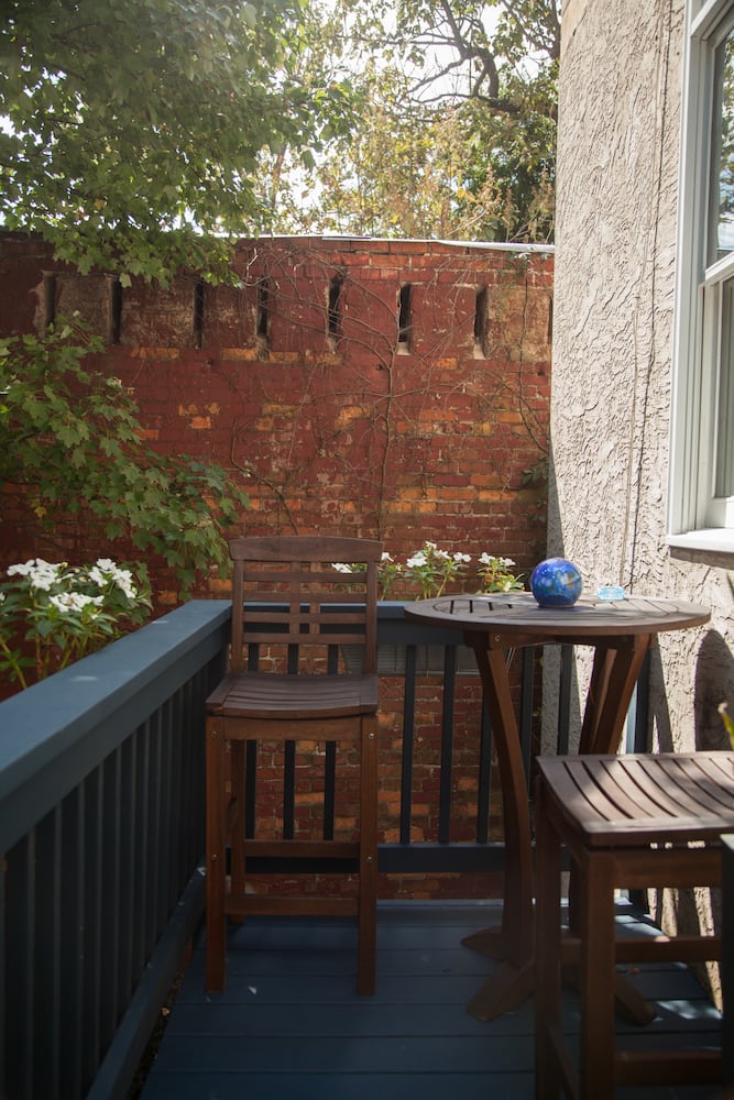 Photos: Exposed brick, loft-style space gives casual vibe to Atlanta townhome