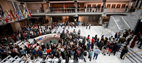 Crowds start to build inside the City Hall as the Council is set to give final approval to legislation that funds the training center.
Miguel Martinez /miguel.martinezjimenez@ajc.com
