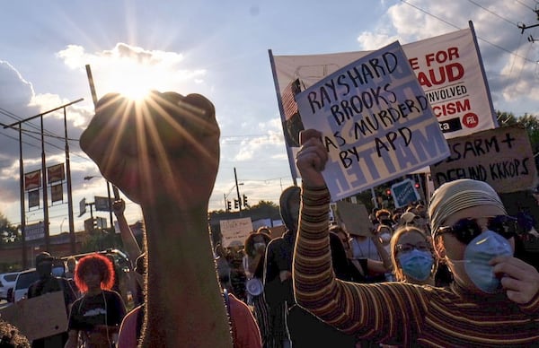 Protesters gather at University Avenue at the Atlanta on Wendy’s where Rayshard Brooks, a 27-year-old black man, was shot and killed by Atlanta police during a struggle in a Wendy’s drive-thru line. Ben Gray for The Atlanta Journal-Constitution