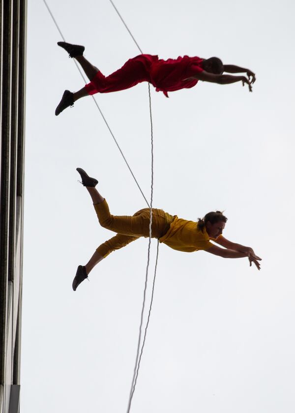 Bandaloop dancers perform on the side of a building facing the Atlanta Beltline on Sunday, October 3, 2021. (Photo: Steve Schaefer for The Atlanta Journal-Constitution)