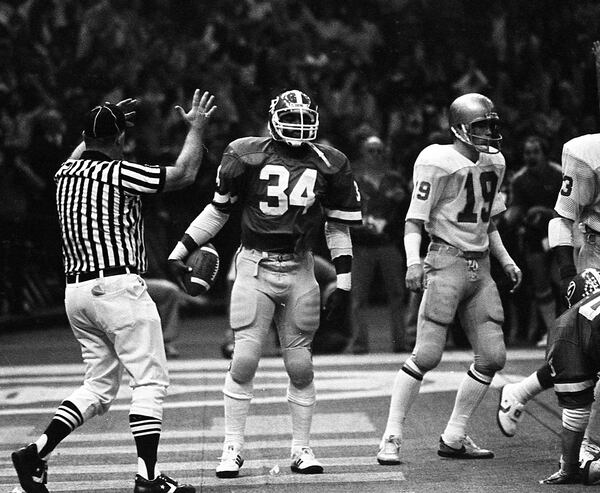 Georgia's Herschel Walker scores a TD in the 1981 Sugar Bowl against Notre Dame. AJC file photo