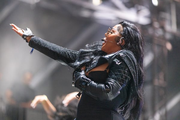 Lil’ Kim performs at ONE Musicfest in Atlanta on Saturday, October 28, 2023. (Arvin Temkar / arvin.temkar@ajc.com)