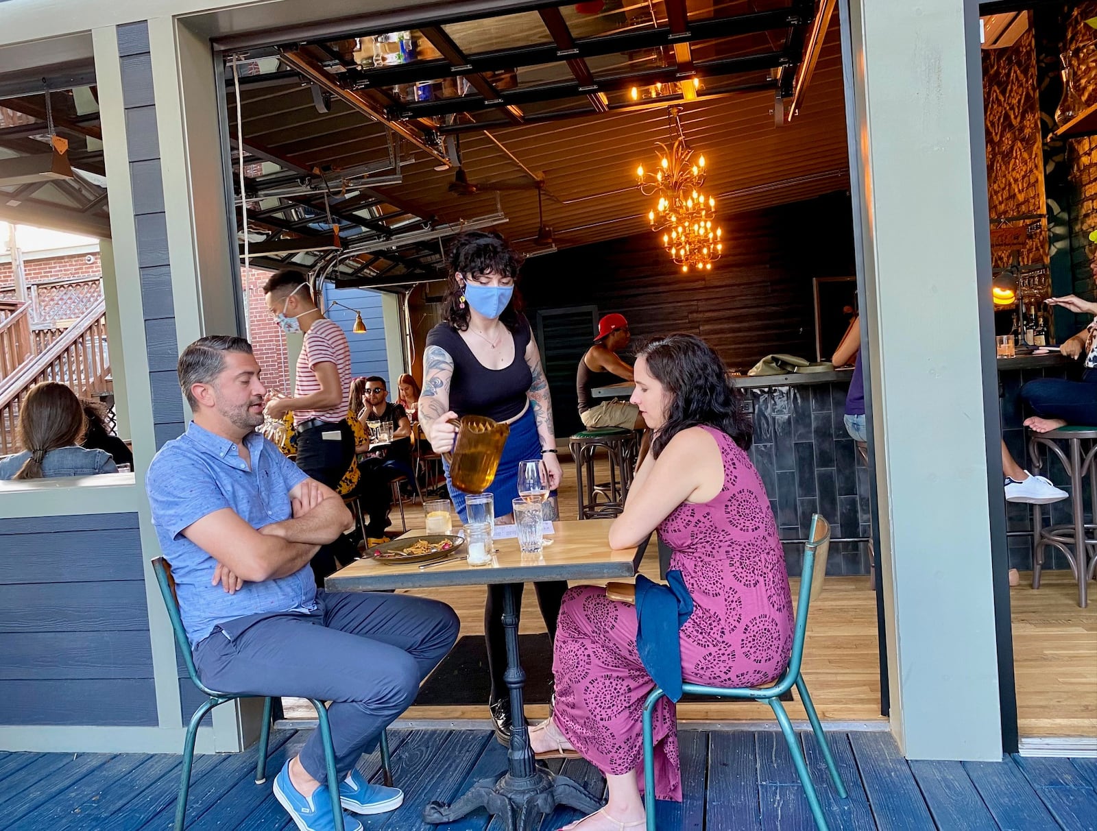 Banshee in East Atlanta Village has a covered patio with a full bar, plus additional seating on the deck. Wendell Brock for The Atlanta Journal-Constitution