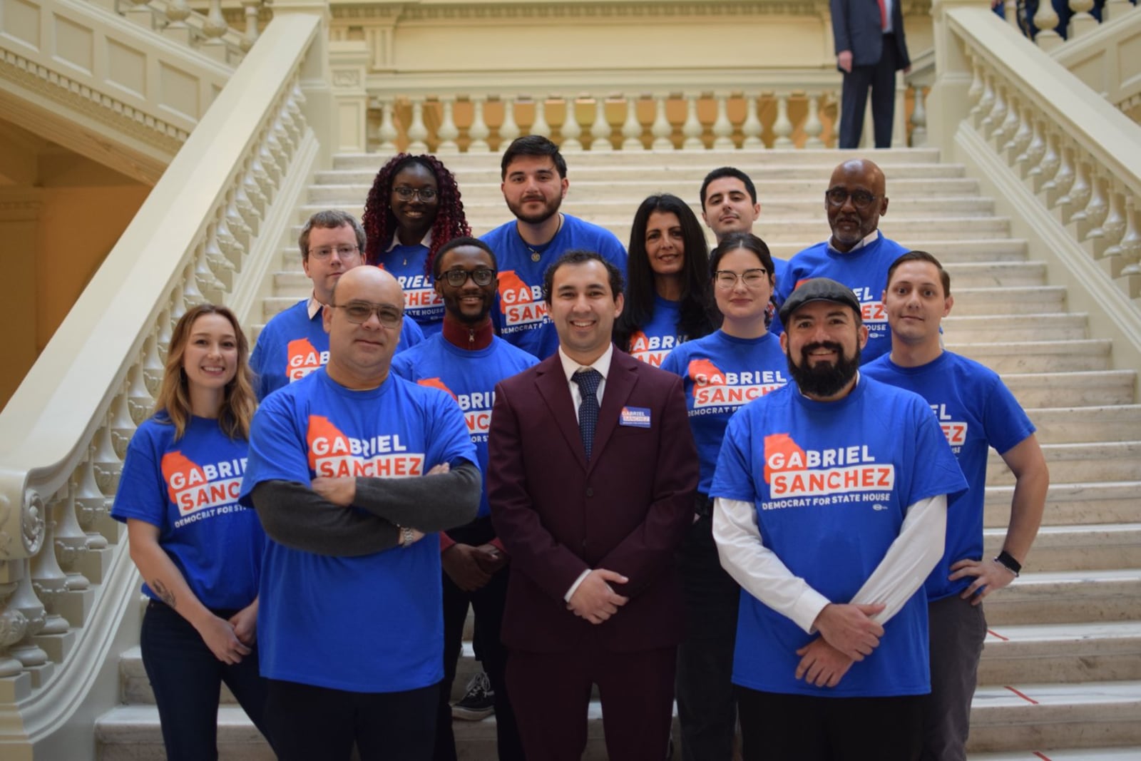 Gabriel Sanchez (in suit) won the Democratic Party primary in May.