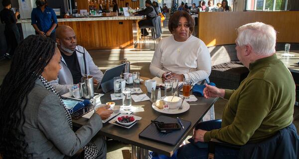 Barbara Jones-Brown, Dwight Zane Burney Sr., Shila Nieves Burney and Sig Mosley talk over breakfast at The Gathering Spot in Atlanta. PHIL SKINNER FOR THE ATLANTA JOURNAL-CONSTITUTION.