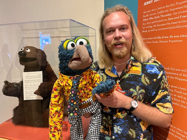 Riley Smith, an aspiring puppeteer, who built his own Gonzo puppet, drove from Orlando, Florida to hear Dave Goelz speak at the Center for Puppetry Arts Wednesday. Photo: Bo Emerson