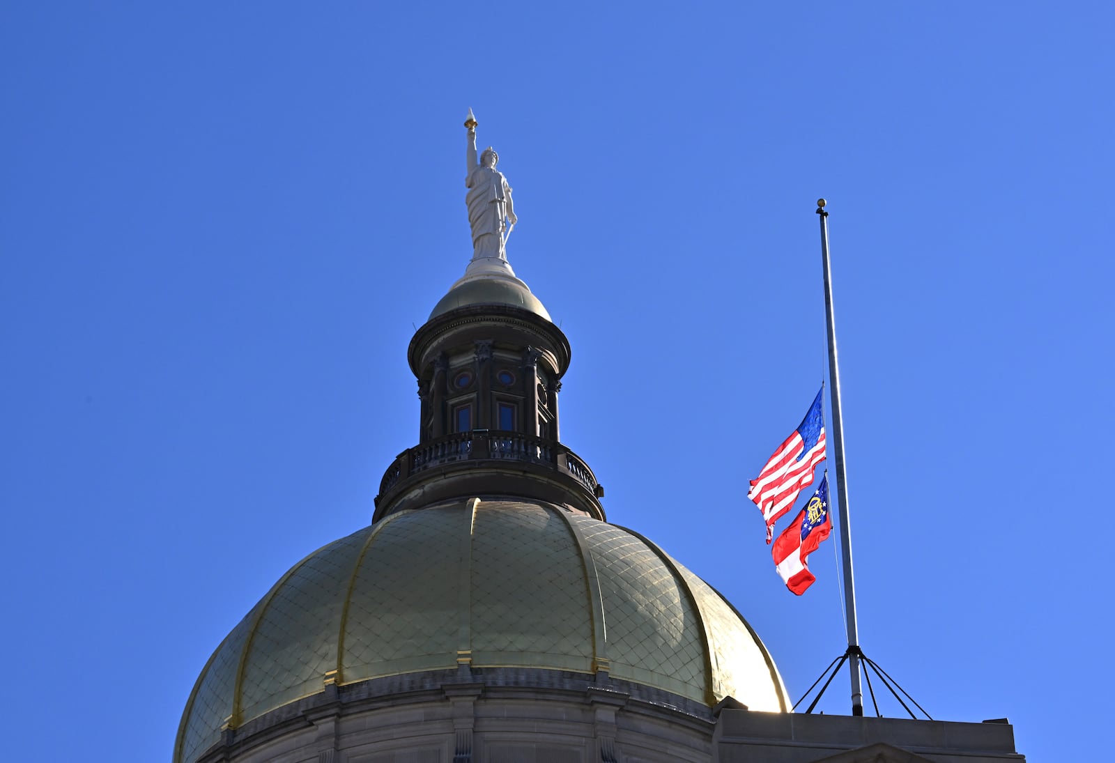 Gov. Brian Kemp has ordered American and Georgia flags be flown at half-staff until sunset Saturday to honor the 22 Americans killed in the attacks by Hamas militants in Israel. (Hyosub Shin/Hyosub.Shin@ajc.com)