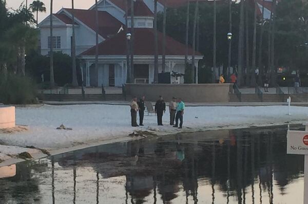 Katherine White Popp posted this image at daybreak Wednesday, showing investigators at the Disney Grand Floridian Resort.