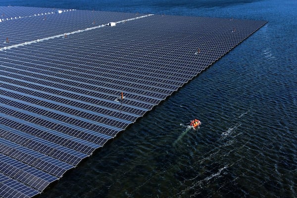 FILE - A floating solar farm operates on the Cottbuser Ostsee lake near Cottbus, Germany, Oct. 16, 2024. (AP Photo/Matthias Schrader, File)