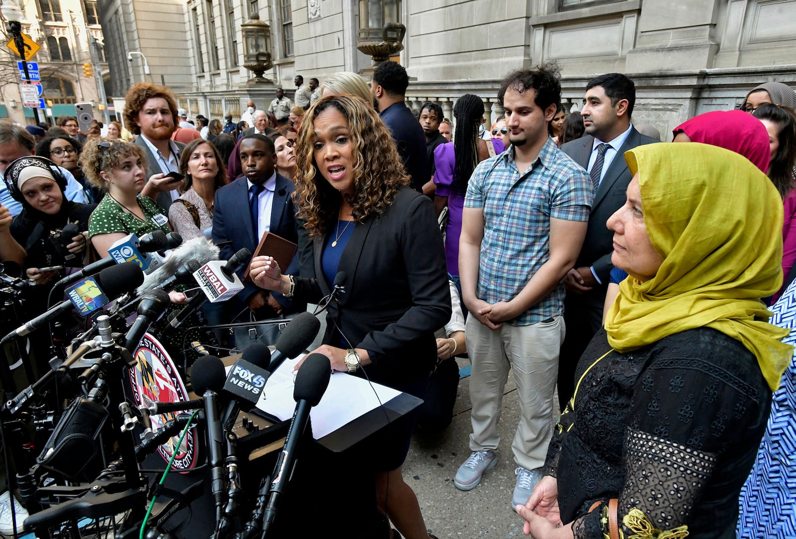 FILE - State's Attorney Marilyn Mosby discusses the release of Adnan Syed after his conviction was overturned, as Syed's mother, Shamim Syed, right, looks on with another son, standing behind Mosby, Sept. 19, 2022, in Baltimore. (Amy Davis/The Baltimore Sun via AP, File)