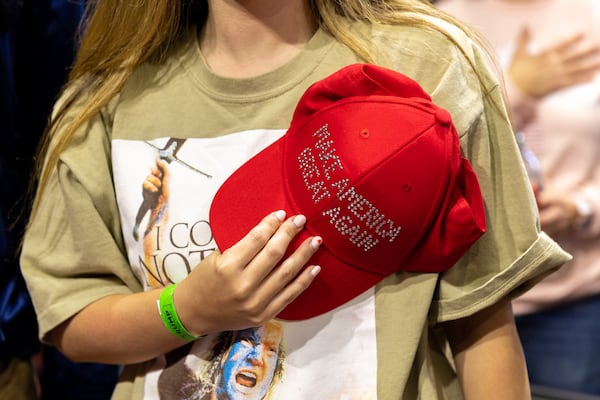 Supporters pledge allegiance to the flag during a rally for former president and Republican presidential candidate Donald Trump at Winthrop Coliseum Rock Hill, South Carolina on Friday, February 23, 2024. (Arvin Temkar / arvin.temkar@ajc.com)