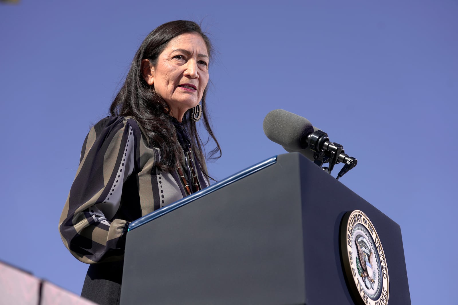 Interior Secretary Deb Haaland speaks at the Gila Crossing Community School in the Gila River Indian Community reservation in Laveen, Ariz., Friday, Oct. 25, 2024. (AP Photo/Manuel Balce Ceneta)