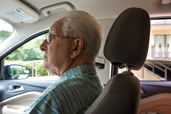 Jack Abbott, 74, course director of the AJC Peachtree Road Race, surveys the progress of potholes and problem areas during a ride along with Atlanta Public Works employees along Peachtree Road in Atlanta, Ga., on Wednesday, June 19, 2019. Abbott, who is serving in his 21st and final year as volunteer course director, says that he starts the prep work for the race each year in late May, after which he works on it every day until the event itself on July 4. "I'm a perfectionist," says Abbott. "I can't reach that but I try." (Casey Sykes for The Atlanta Journal-Constitution)