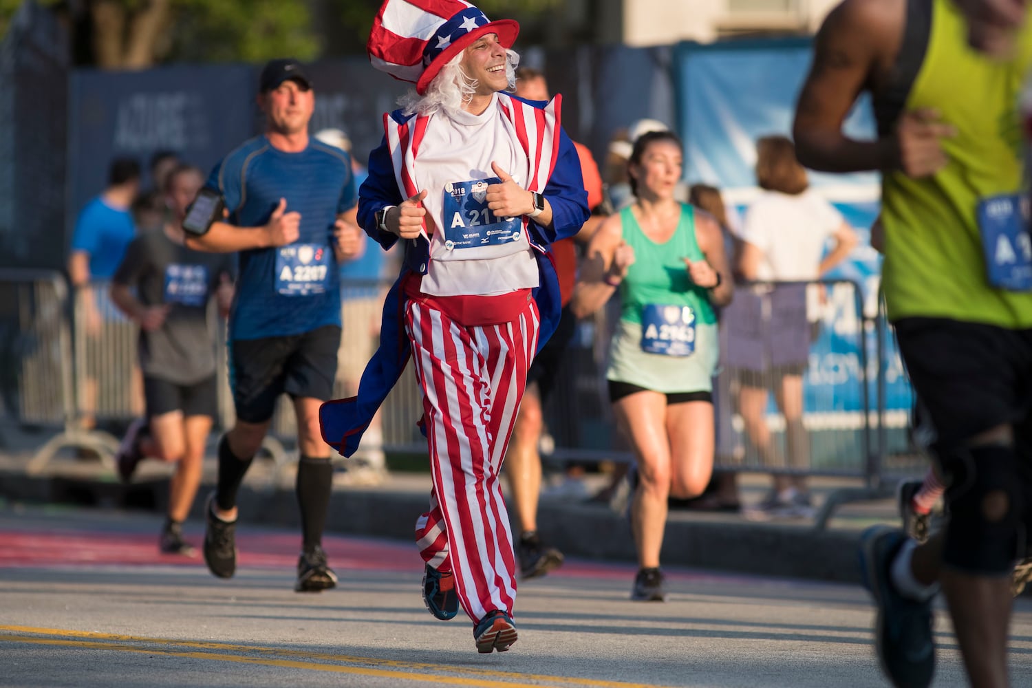 Runners show fashion flair during AJC Peachtree Road Race