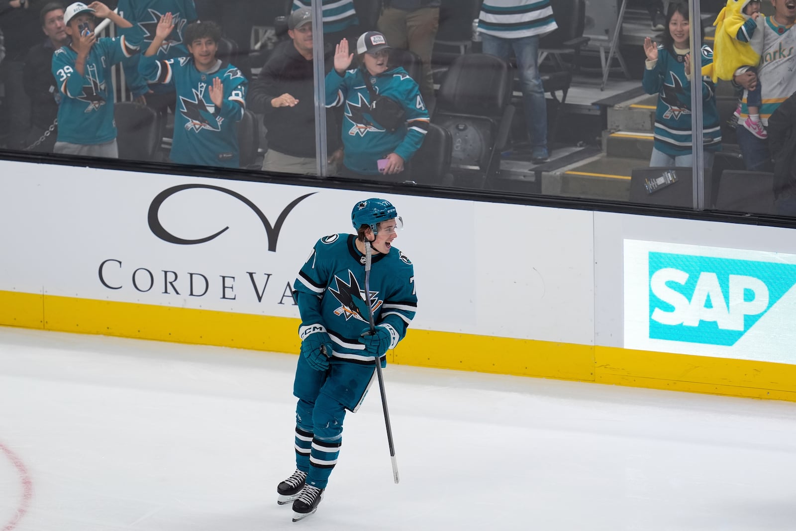 San Jose Sharks center Macklin Celebrini skates on the ice after his goal during the first period of an NHL hockey game against the St. Louis Blues, Thursday, Oct. 10, 2024, in San Jose, Calif. (AP Photo/Godofredo A. Vásquez)