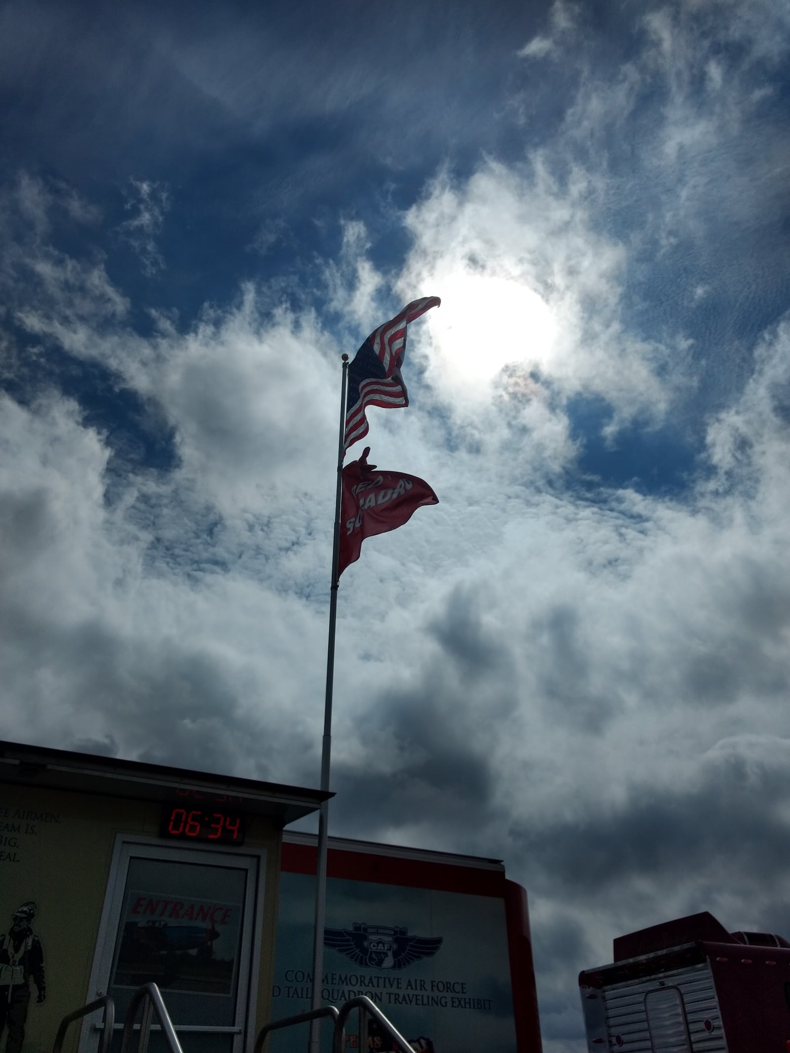 The flag of the Tuskegee Airmen flew with the U.S. flag. (Brian O'Shea / bposhea@ajc.com)