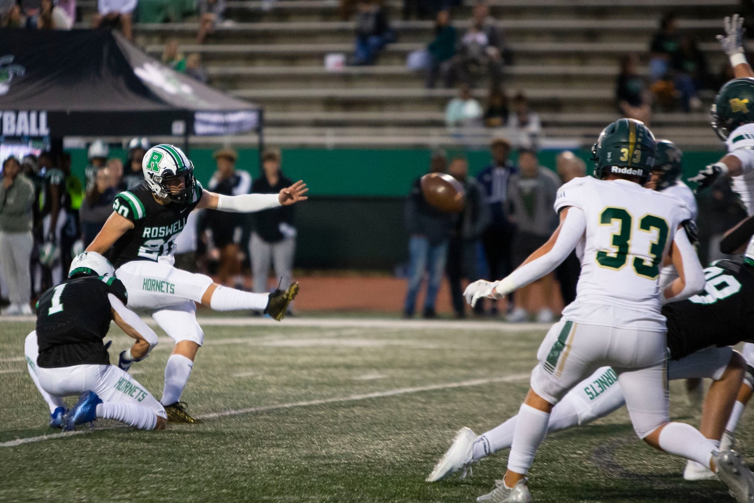 Brett Gonda, kicker for Roswell, kicks a field goal during the Blessed Trinity vs. Roswell high school football game on Thursday, September 29, 2022, at Roswell high school in Roswell, Georgia. Roswell defeated Blessed Trinity 41-10. CHRISTINA MATACOTTA FOR THE ATLANTA JOURNAL-CONSTITUTION.